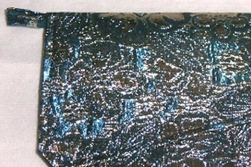 Clutch aus Brokat mit aufwendigem Blumenprint von de-lux