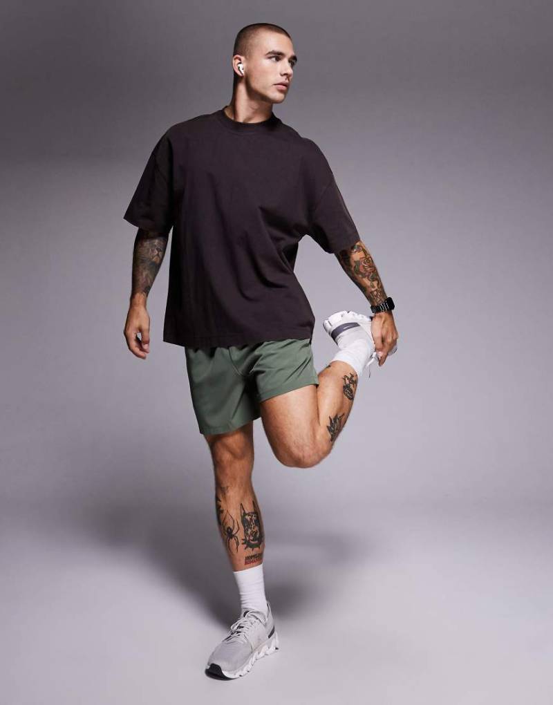 4505 - Icon - Oversize-T-Shirt aus schwerer Baumwolle in verwaschenem Kaffee-Braun mit schnelltrocknendem Finish von 4505