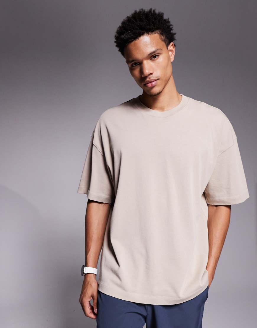 4505 - Icon - Schnelltrocknendes Oversize-T-Shirt aus schwerer Baumwolle in verwaschenem Steinbeige-Neutral von 4505