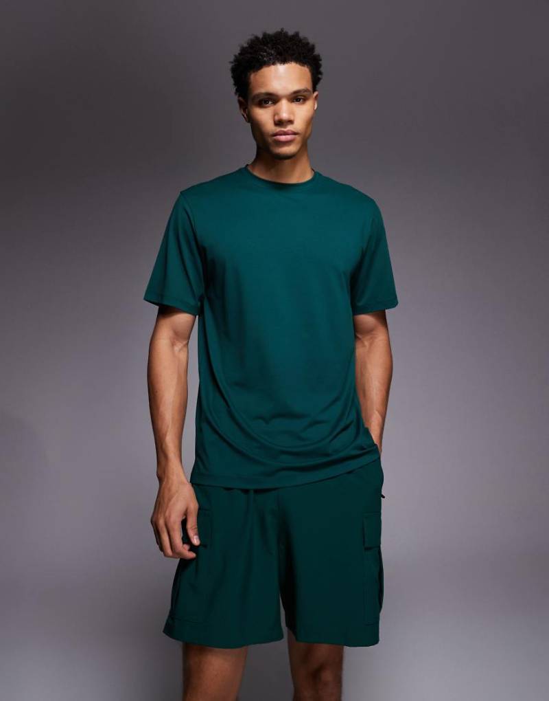 4505 - Icon - Sport-T-Shirt aus schnell trocknendem Netzstoff in Flaschengrün von 4505