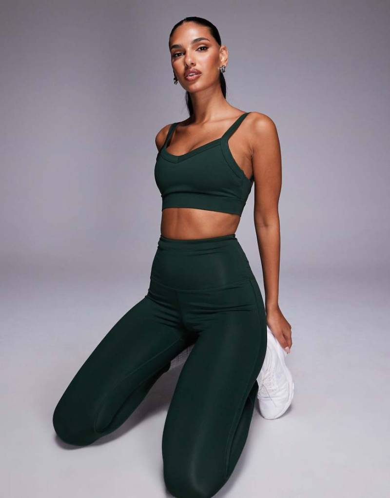 4505 - Lauf-Leggings in Flechtengrün mit hohem Bund und Handytasche mit Reißverschluss von 4505