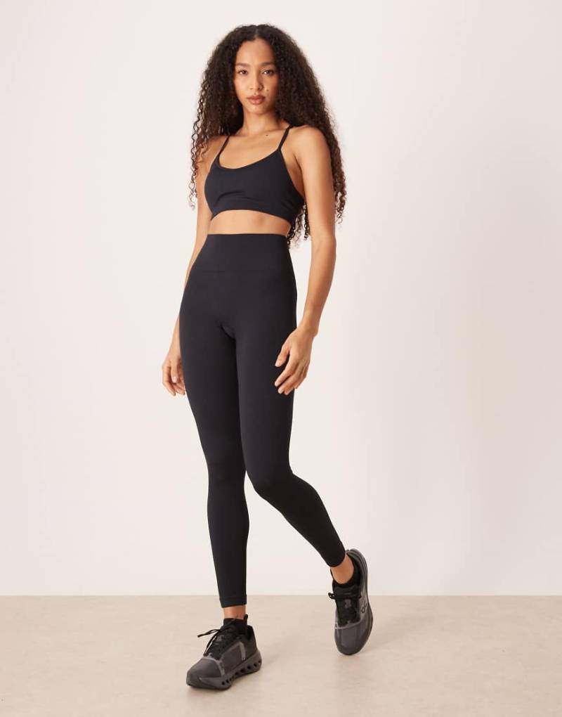 4505 - Nahtlose Sport-Leggings in Schwarz mit hohem Bund und feiner Rippenstruktur von 4505