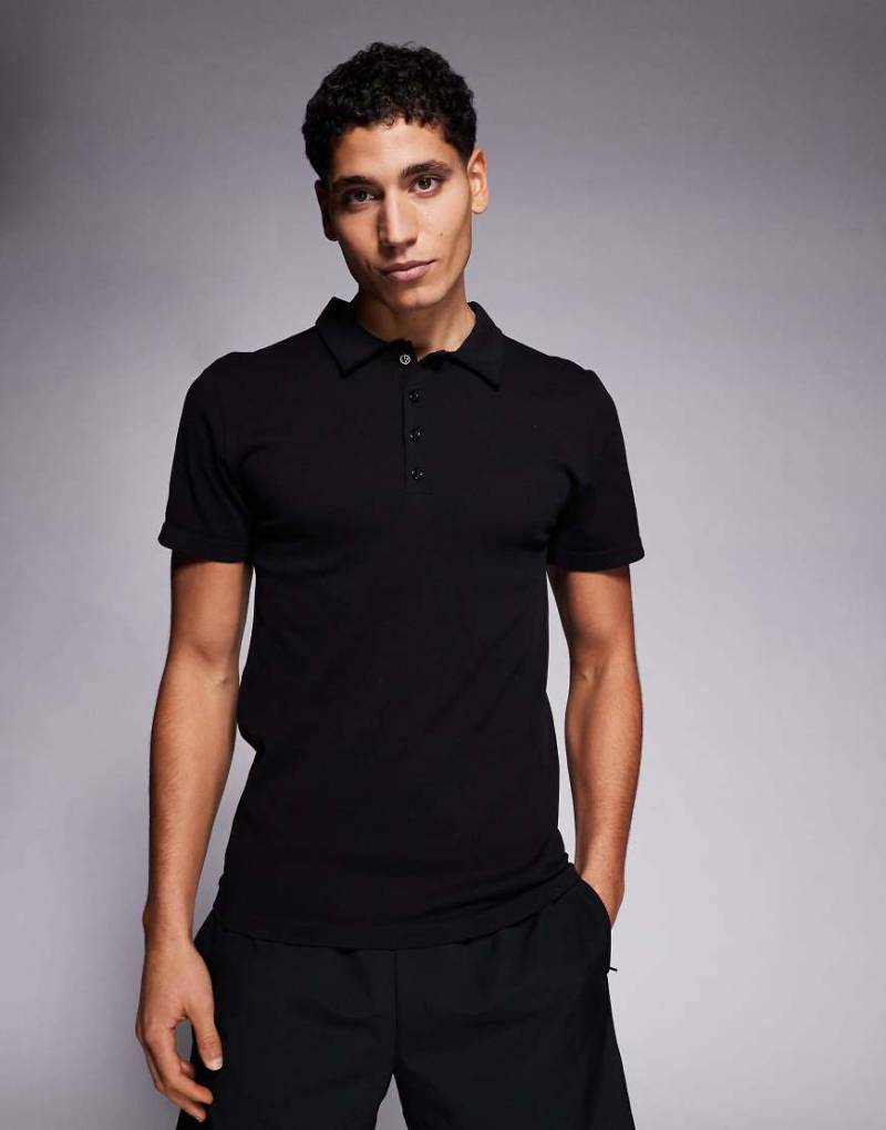 4505 - Nahtloses, geripptes Slim-Fit-Polohemd in Schwarz von 4505