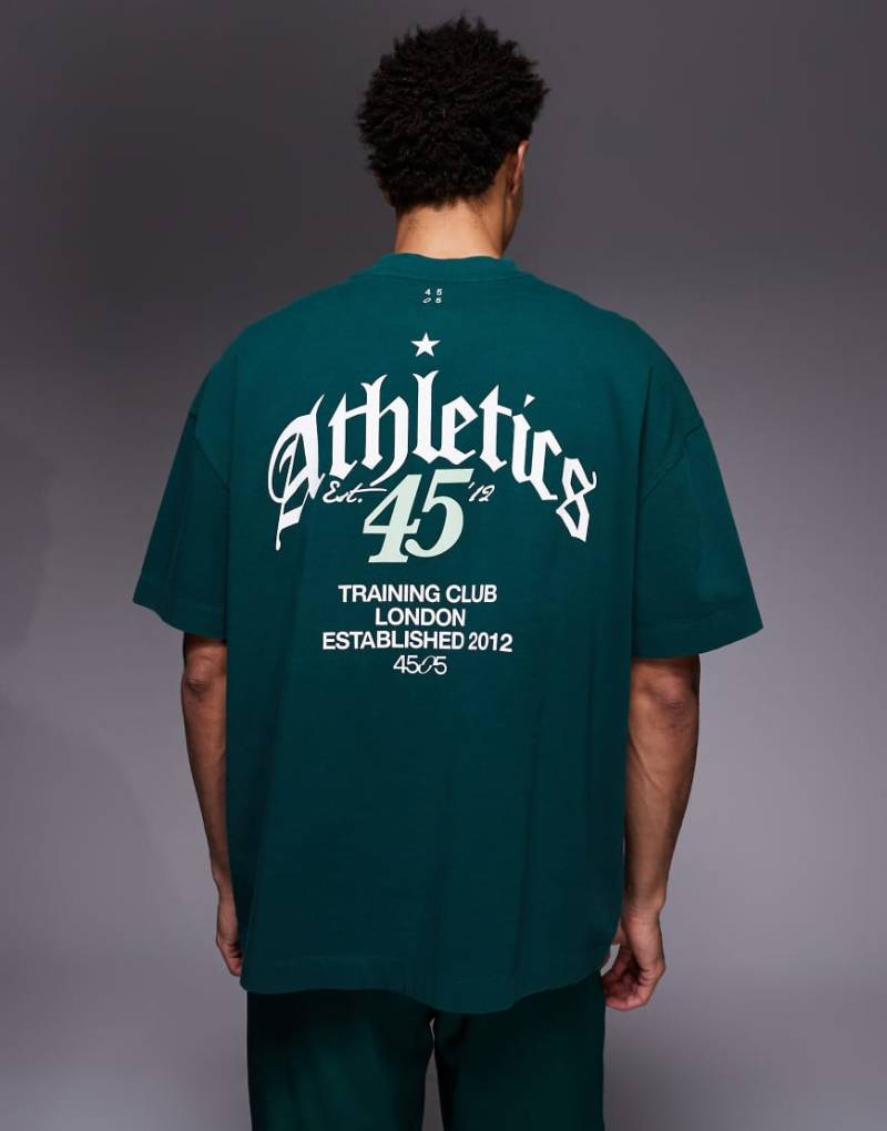 4505 - Oversize-T-Shirt aus schwerer Baumwolle in verwaschenem Flaschengrün mit schnell trocknendem Finish und Grafik hinten von 4505