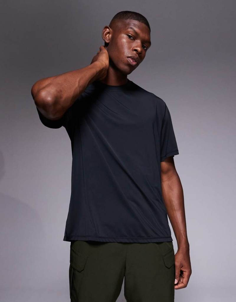 4505 - Schnelltrocknendes, Lauf-T-Shirt aus Performance-Nylon und Netzstoff in Schwarz mit Oversize-Passform von 4505