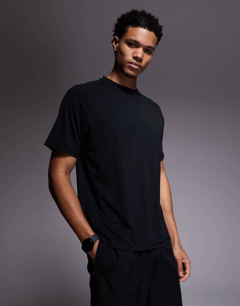 4505 - Schnelltrocknendes, kastiges Trainings-T-Shirt aus Performance-Jersey in Schwarz von 4505