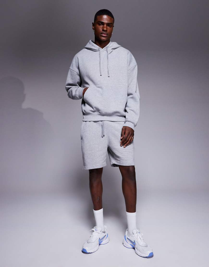 4505 - Schwerer Trainings-Kapuzenpullover in meliertem Grau aus Baumwolle mit schnelltrocknendem Finish von 4505