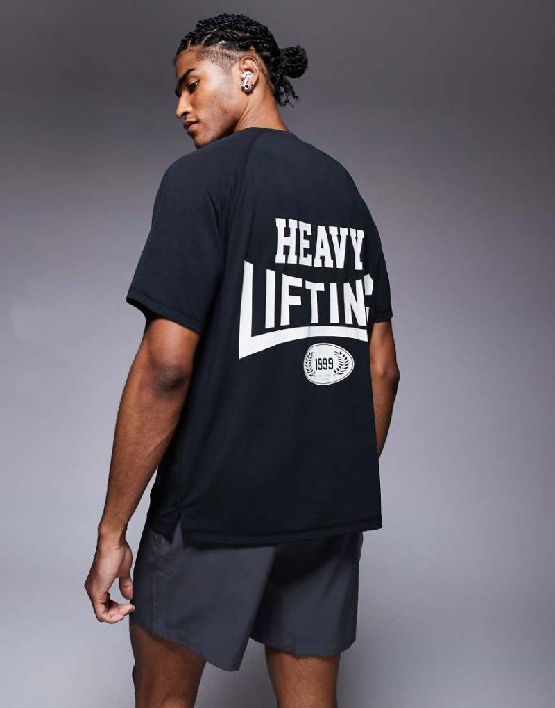 4505 - Sport-T-Shirt aus schnell trocknendem Material in Schwarz mit „Heavy Lifting"-Rückenprint von 4505