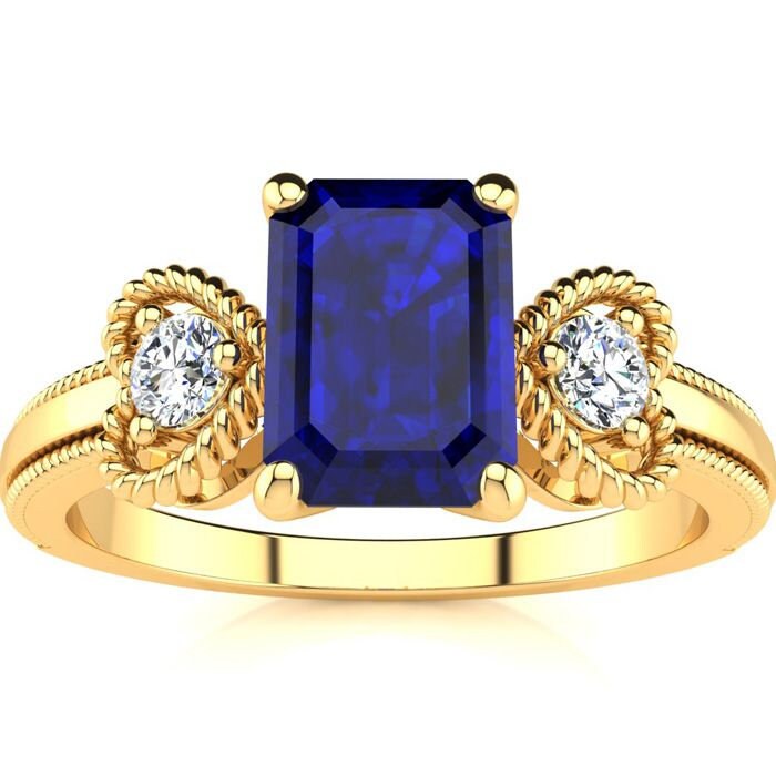 10 Karat Gelbgold 1 1/4 Smaragdschliff Saphir Und Zwei Diamant Herz Ring von 47thStreetJewelry