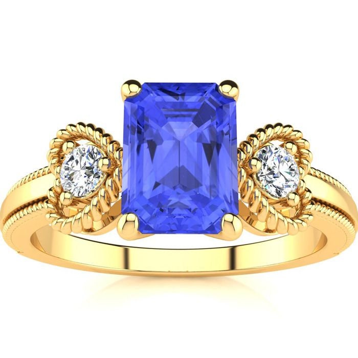 10 Karat Gelbgold 1 1/4 Smaragdschliff Tansanit Und Zwei Diamant Herz Ring von 47thStreetJewelry