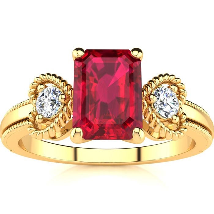 10 Karat Gelbgold 1 Smaragdschliff Rubin Und Zwei Diamant Herz Ring von 47thStreetJewelry