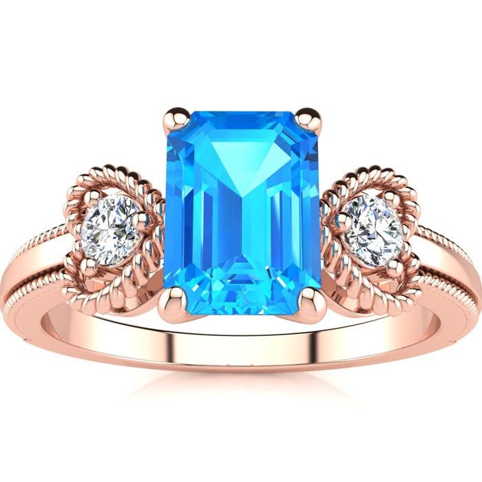 10 Karat Rose Gold 1 1/3 Smaragdschliff Blautopas Und Zwei Diamant Herz Ring von 47thStreetJewelry