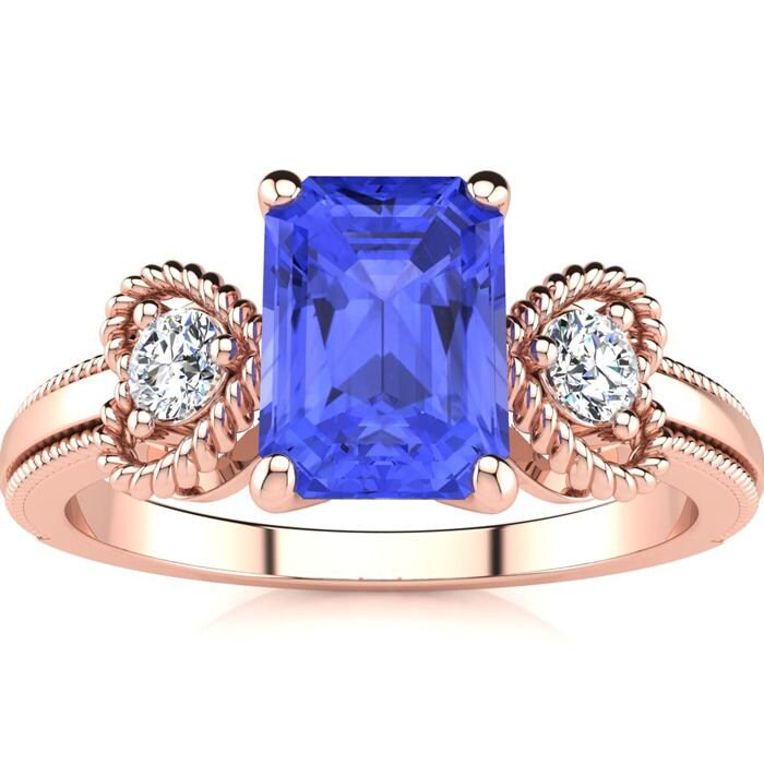 10 Karat Rose Gold 1 1/4 Smaragdschliff Tansanit Und Zwei Diamant Herz Ring 10 Karat Rose Gold 1 1/4 Smaragdschliff Tansanit Und Zwei Diamant Herz Ring von 47thStreetJewelry