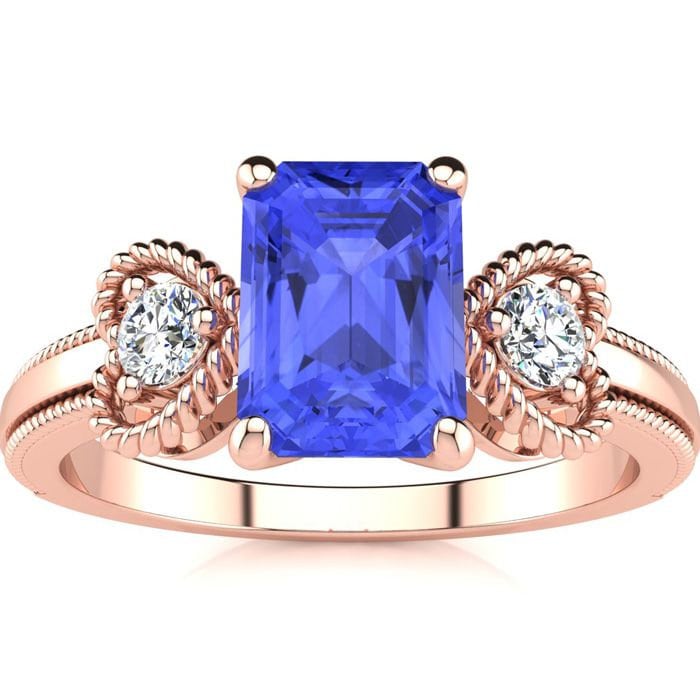 10 Karat Rose Gold 1 1/4 Smaragdschliff Tansanit Und Zwei Diamant Herz Ring 10 Karat Rose Gold 1 1/4 Smaragdschliff Tansanit Und Zwei Diamant Herz Ring von 47thStreetJewelry