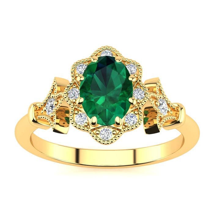 14 Karat Gelbgold 1 Oval Form Smaragd Und Halo Diamant Vintage Ring von 47thStreetJewelry