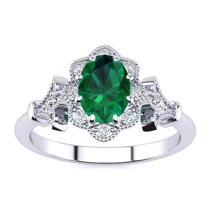 14 Karat Weißgold 1 Oval Form Smaragd Und Halo Diamant Vintage Ring von 47thStreetJewelry