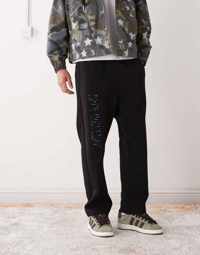 AAPE BY A BATHING APE - Loose-Fit-Jogginghose in Schwarz mit Beinstickerei von AAPE BY A BATHING APE®
