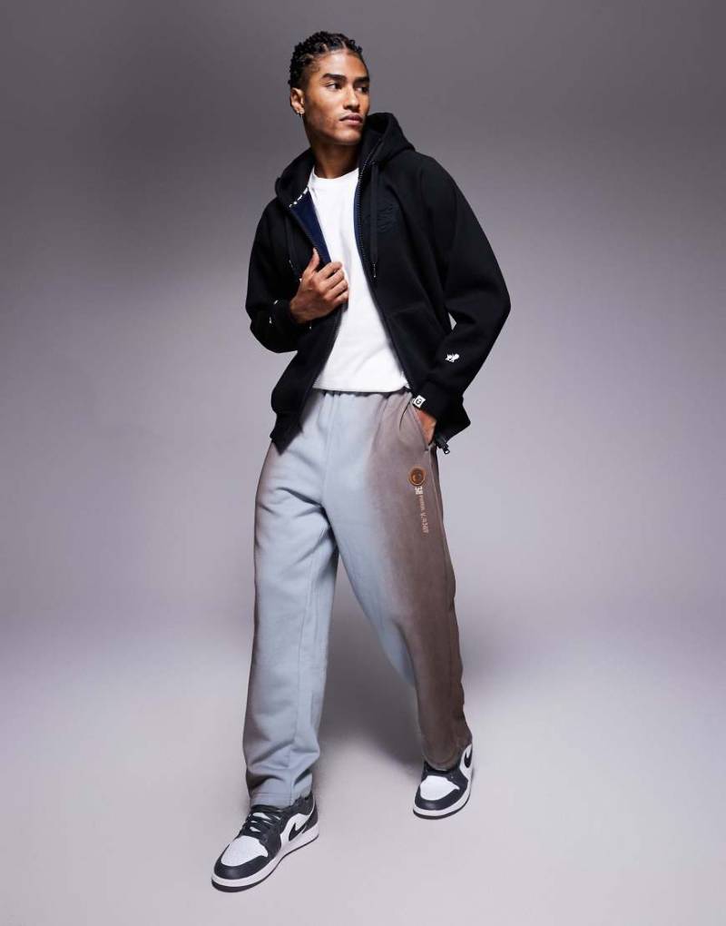 AAPE BY A BATHING APE - Loose-Fit-Jogginghose in verwaschenem Blau mit Beinstickerei von AAPE BY A BATHING APE®