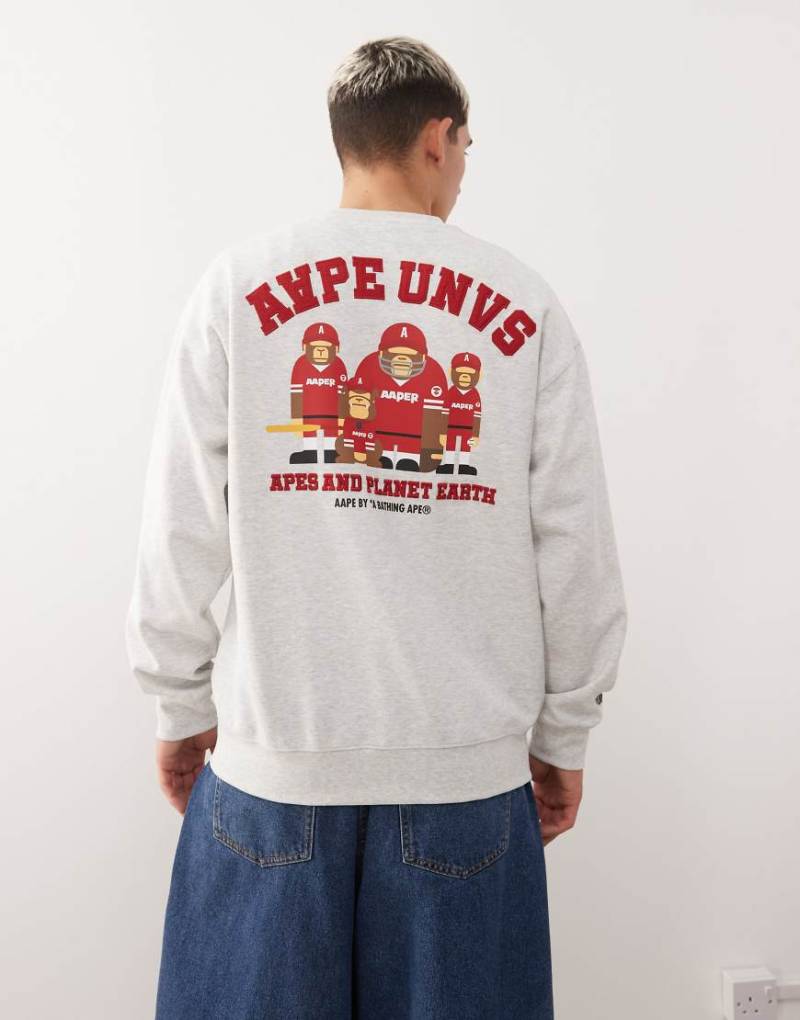AAPE BY A BATHING APE - Sweatshirt in Grau mit Rundhalsausschnitt und Team-Rückenprint von AAPE BY A BATHING APE®