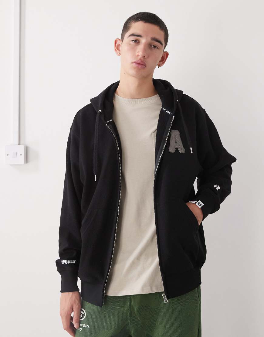 Aape by A Bathing Ape - Kapuzenjacke in Schwarz mit Reißverschluss und A-Applikation von AAPE BY A BATHING APE®