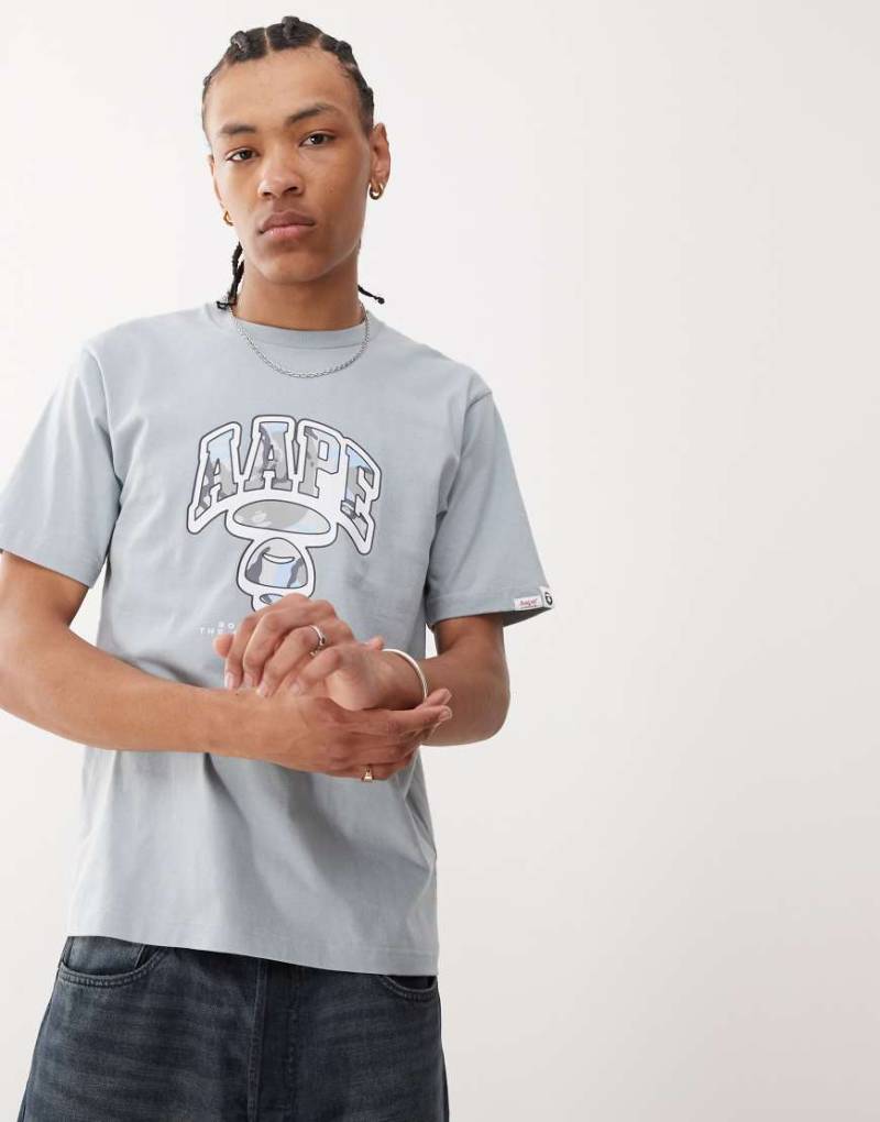 Aape by A Bathing Ape - T-Shirt in Blau mit Graffiti-Logo von AAPE BY A BATHING APE®