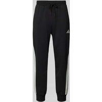 adidas Sportswear Relaxed Fit Sweatpants mit Logo-Print in Black, Größe XL adidas Sportswear Relaxed Fit Sweatpants mit Logo-Print in Black, Größe XL von adidas Sportswear