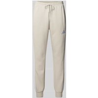 ADIDAS SPORTSWEAR Sweatpants mit Label-Stitching und elastischem Bund in Sand, Größe XXL ADIDAS SPORTSWEAR Sweatpants mit Label-Stitching und elastischem Bund in Sand, Größe XXL von ADIDAS SPORTSWEAR