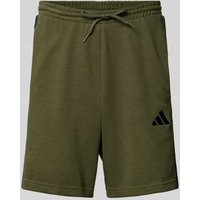 ADIDAS SPORTSWEAR Sweatshorts mit Label-Stitching und elastischem Bund in Oliv, Größe XXL ADIDAS SPORTSWEAR Sweatshorts mit Label-Stitching und elastischem Bund in Oliv, Größe XXL von ADIDAS SPORTSWEAR