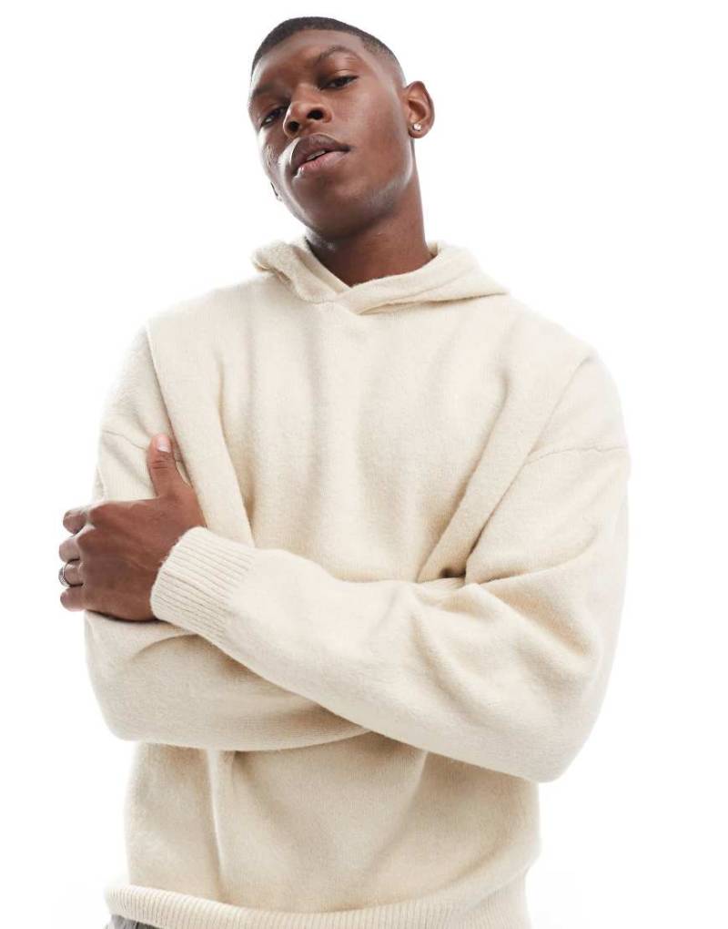 ADPT - Oversize-Kapuzenpullover aus Strick in Cremeweiß von ADPT