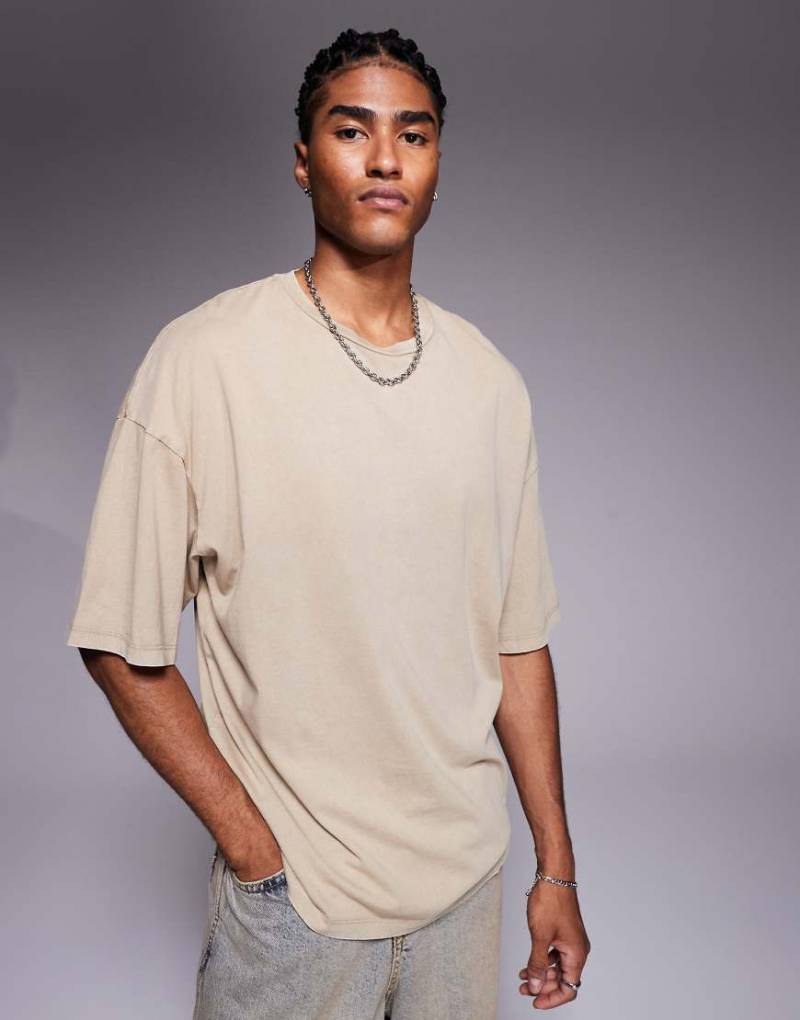 ADPT - Oversize-T-Shirt in verwaschenem Cremeweiß von ADPT