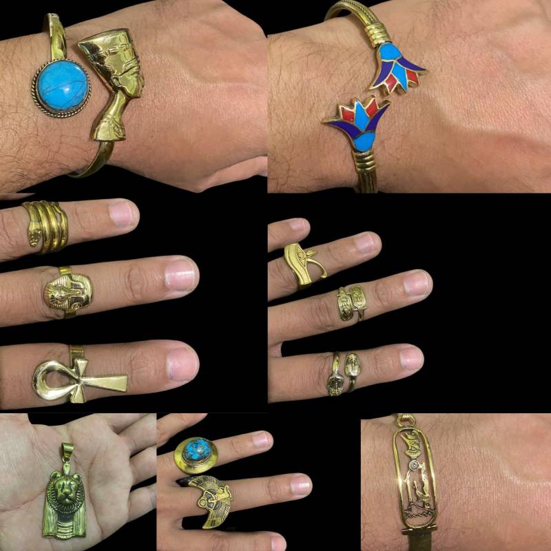 Set Aus Ringen, Armreifen Und Einer Kette in Der Form Von Sachmet von AMIIDOS