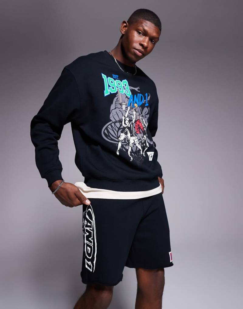 AND1 - Oversize-Shorts in Schwarz mit Sport-Print und offenem Saum von AND1