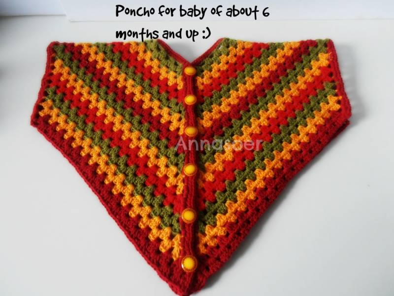 Babyponcho Gehäkelter Rasta-Poncho in Rot, Gelb Und Grün von ANNASOERDOLLS