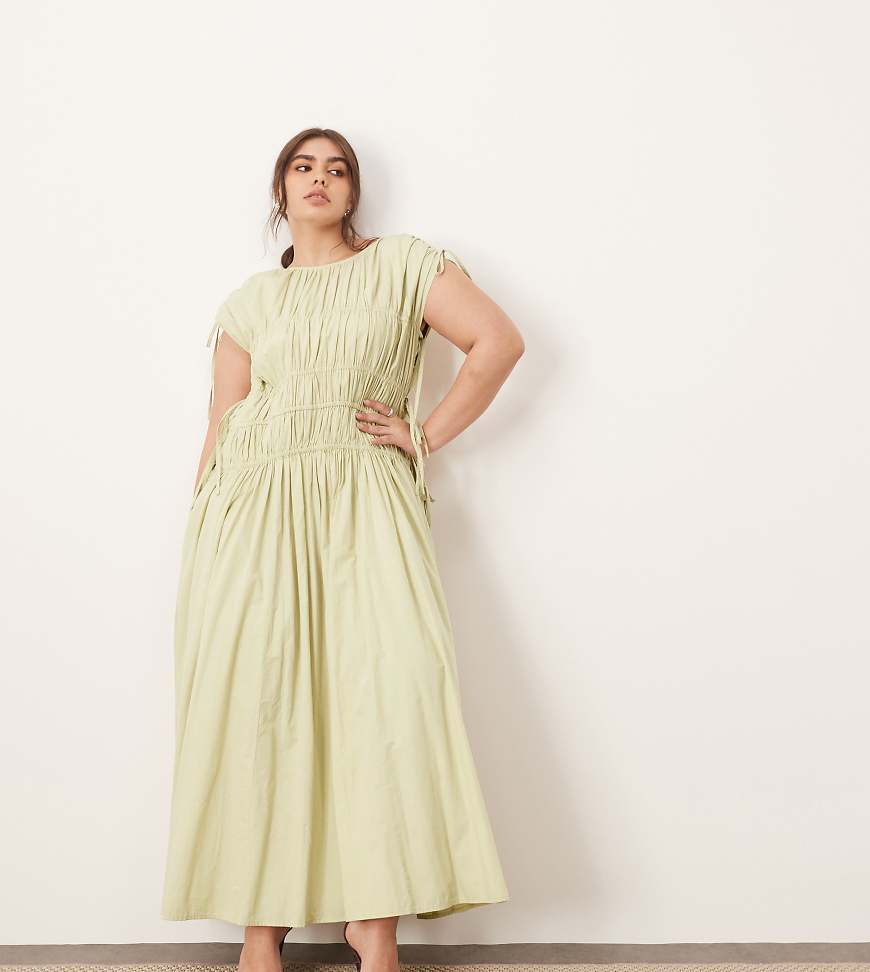 ARRANGE Curve - Ausgestelltes Midikleid aus Baumwolle in verwaschenem Salbeigrün mit Kordelzug und Taschen-Gelb von ARRANGE