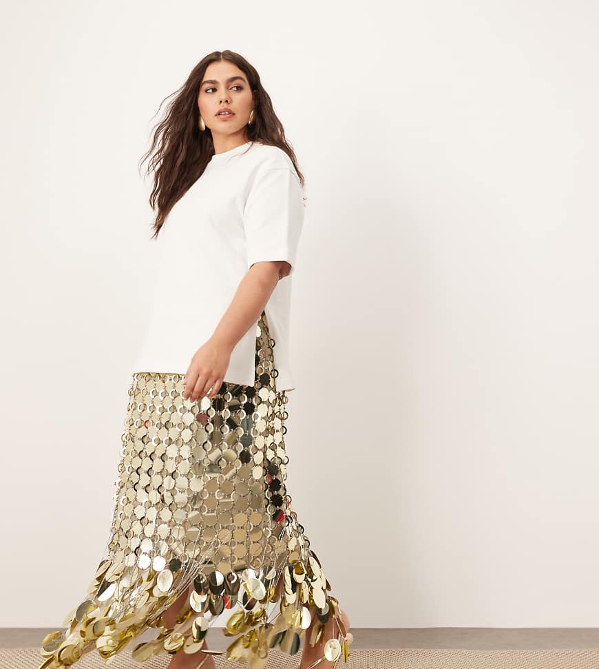 ARRANGE Curve - Futuristischer Midirock in Gold mit Paillettenverzierung und Fransensaum-Goldfarben ARRANGE Curve - Futuristischer Midirock in Gold mit Paillettenverzierung und Fransensaum-Goldfarben von ARRANGE
