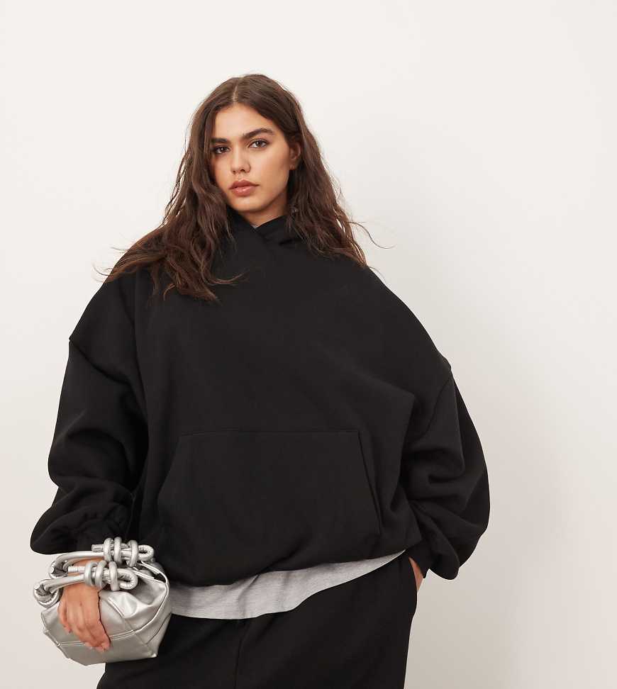 ARRANGE Curve - Hochwertiger, schwerer Oversize-Kapuzenpullover in Schwarz ARRANGE Curve - Hochwertiger, schwerer Oversize-Kapuzenpullover in Schwarz von ARRANGE