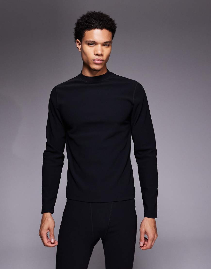 ASOS 4505 - Ski - Geripptes Thermo-Baselayer-Oberteil aus schweißableitendem Material in Schwarz mit Fleece-Innenseite und Stehkragen von ASOS 4505 Ski & Snow