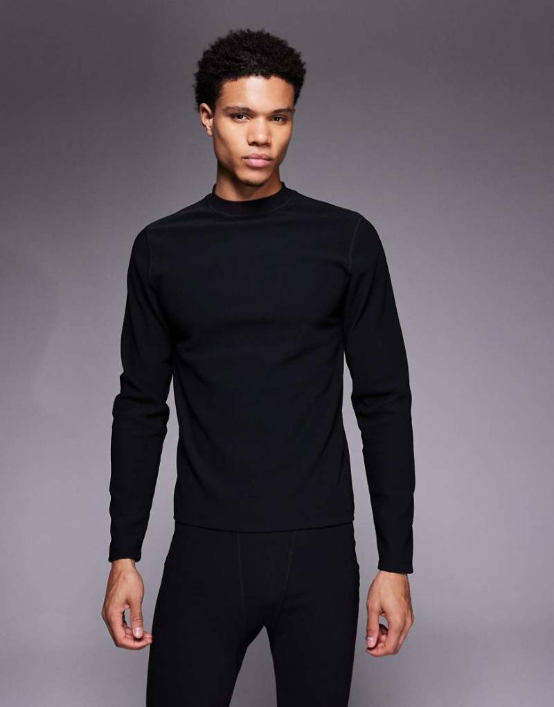 ASOS 4505 - Ski - Geripptes Thermo-Baselayer-Oberteil aus schweißableitendem Material in Schwarz mit Fleece-Innenseite und Stehkragen von ASOS 4505 Ski & Snow