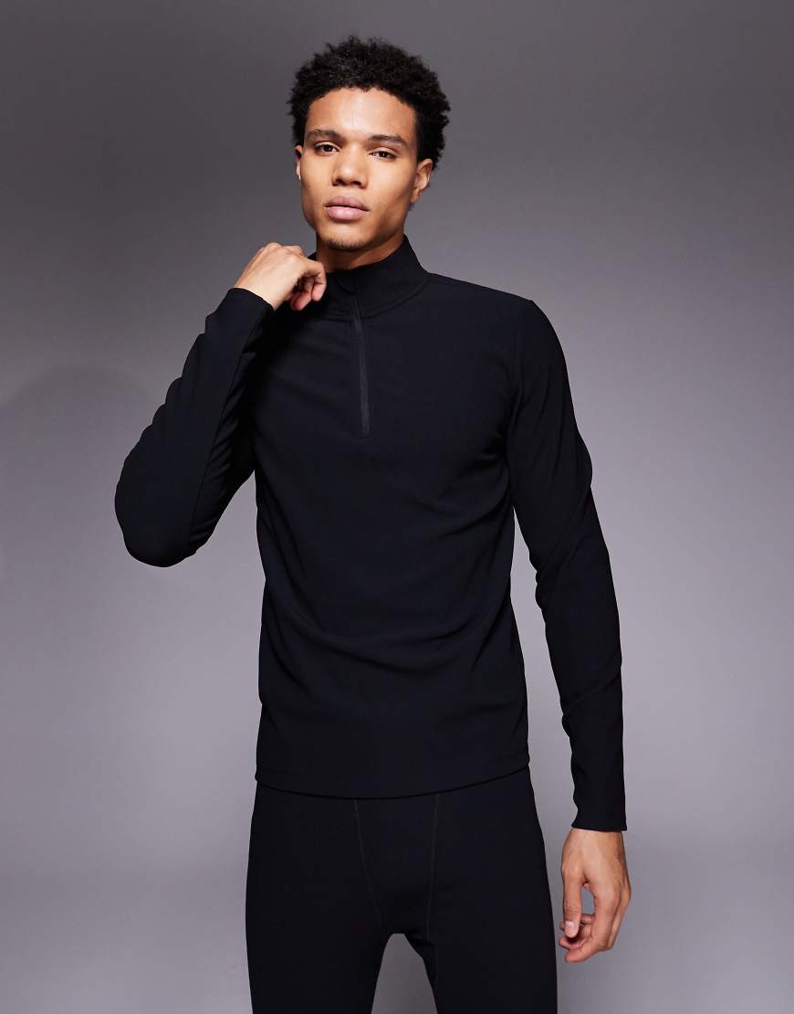 ASOS 4505 Ski - Thermisches, geripptes Baselayer-Oberteil aus schweißableitendem Material in Schwarz mit Fleece-Innenseite und kurzem Reißverschluss von ASOS 4505 Ski & Snow