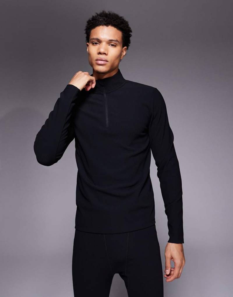 ASOS 4505 Ski - Thermisches, geripptes Baselayer-Oberteil aus schweißableitendem Material in Schwarz mit Fleece-Innenseite und kurzem Reißverschluss von ASOS 4505 Ski & Snow
