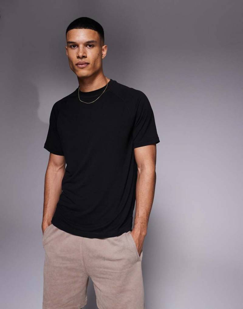 4505 - Icon - Boxy Fit Oversize-Sport-T-Shirt in Schwarz aus Performance-Jersey von 4505