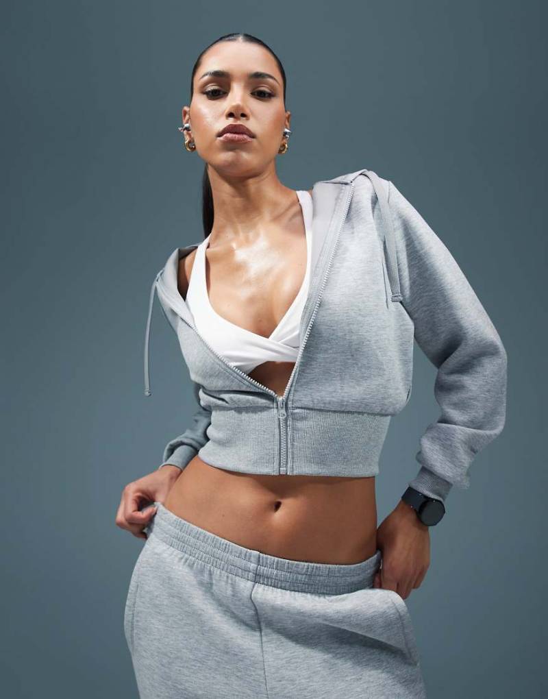 4505 - Kurz geschnittener Performance-Kapuzenpullover in Grau meliert von 4505
