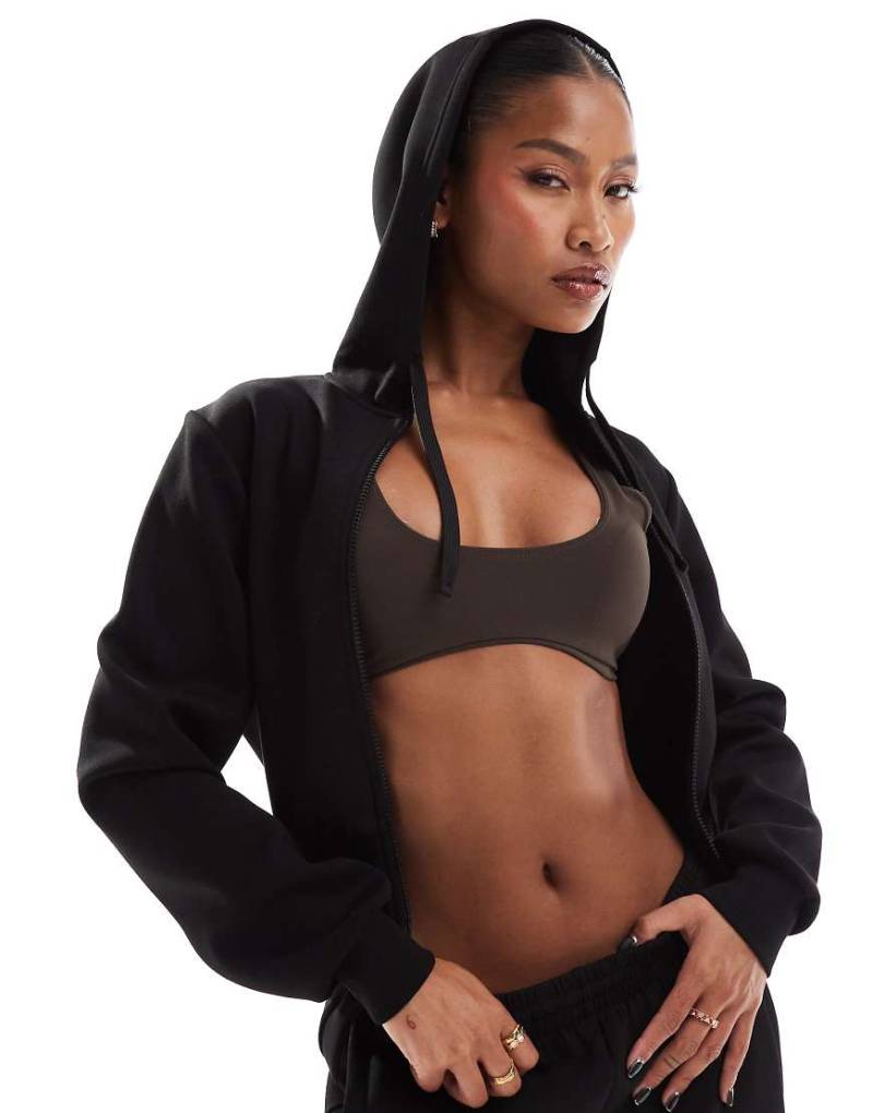 4505 - Kurz geschnittener Performance-Kapuzenpullover in Schwarz von 4505
