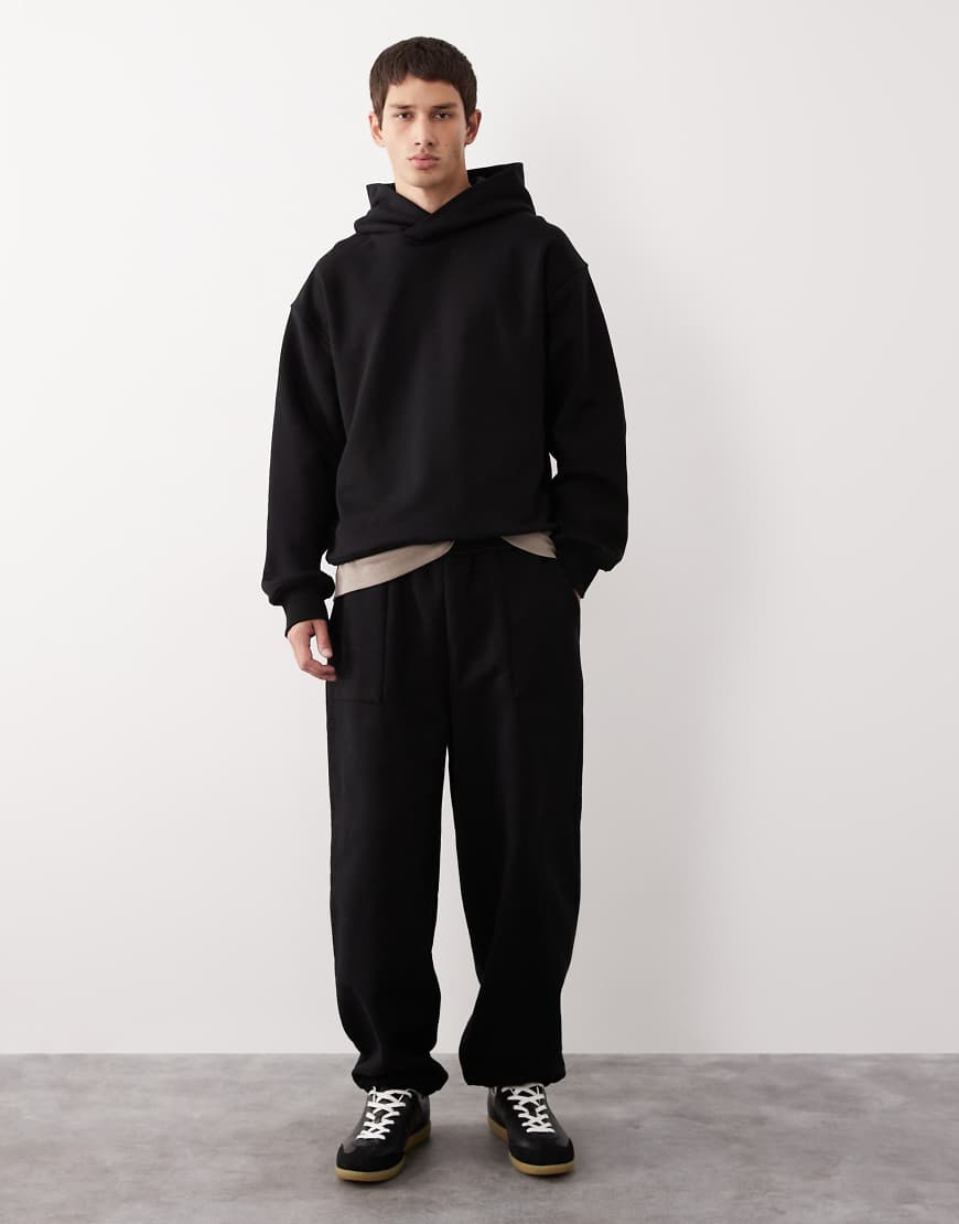 ASOS COLLECTIVE - AC-B-2571 - Jogginghose aus schwerem Stoff in Schwarz mit Bündchen und Signatur von ASOS COLLECTIVE