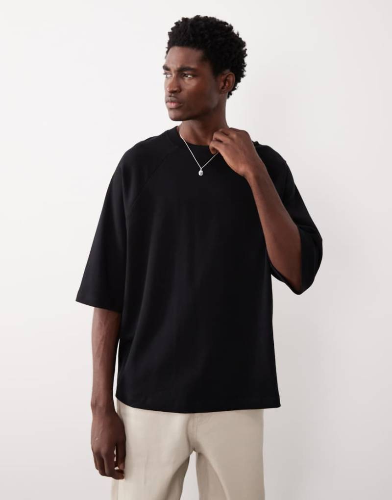 ASOS COLLECTIVE - AC-T-255 - Super-Oversize-T-Shirt aus Interlock-Stoff in Schwarz mit Raglanärmeln von ASOS COLLECTIVE