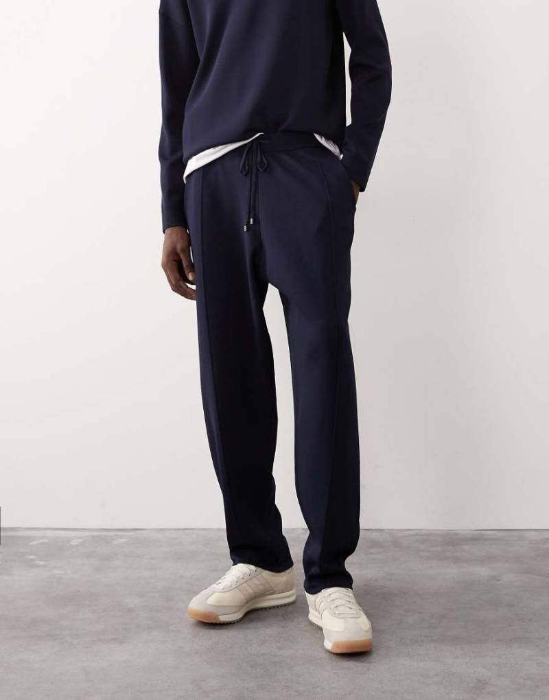 ASOS COLLECTIVE - Schmal zulaufende Jogginghose aus Strick in Marineblau, Kombiteil-Grau ASOS COLLECTIVE - Schmal zulaufende Jogginghose aus Strick in Marineblau, Kombiteil-Grau von ASOS COLLECTIVE