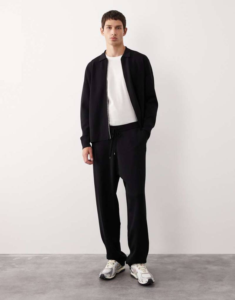 ASOS COLLECTIVE - Schmal zulaufende Jogginghose aus Strick in Schwarz, Kombiteil-Grau von ASOS COLLECTIVE