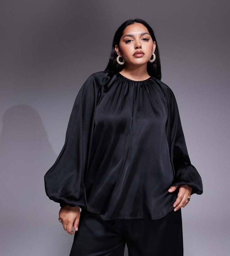 ASOS DESIGN Cruve - Bluse aus Satin in Schwarz mit voluminösen Ärmeln von ASOS Curve