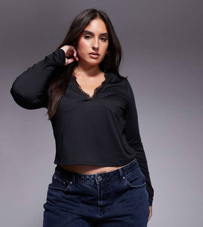 ASOS DESIGN Curve - Anschmiegsames, langärmliges Oberteil in Schwarz mit tiefem V-Ausschnitt und Spitzenborte von ASOS Curve