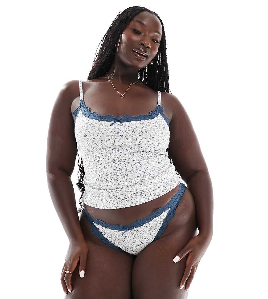ASOS DESIGN Curve - Cassie - Set aus geripptem Camisole und Slip in Grau und Marineblau mit Blümchenmuster ASOS DESIGN Curve - Cassie - Set aus geripptem Camisole und Slip in Grau und Marineblau mit Blümchenmuster von ASOS Curve